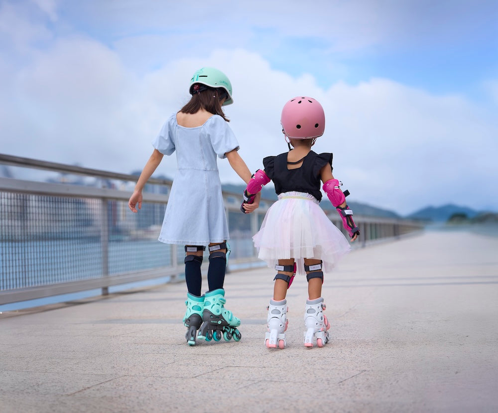 Two Girls Skating.jpg__PID:9751b31e-0438-4f13-9bac-c8953a2416ce