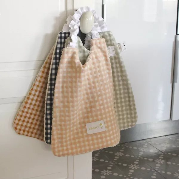 barnabe-aime-le-café-elastic-towel-bib-amande-24x31cm-barn-serviet-amande