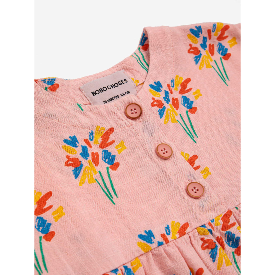 bobo-choses-baby-fireworks-all-over-woven-dress-pink-bobo-s24124ab103-6m