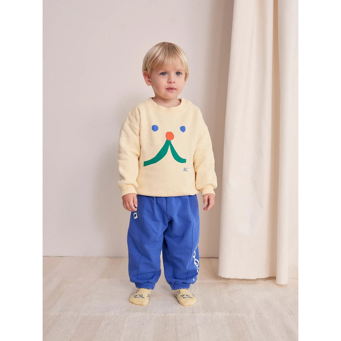 bobo-choses-baby-funny-face-sweatshirt-light-yellow-bobo-w24b224ab030-12m