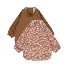 konges-slojd-2-pack-dinner-bib-with-sleeves-unicorn-blush-toasted-coconut-kong-s23ks4301-ubtc
