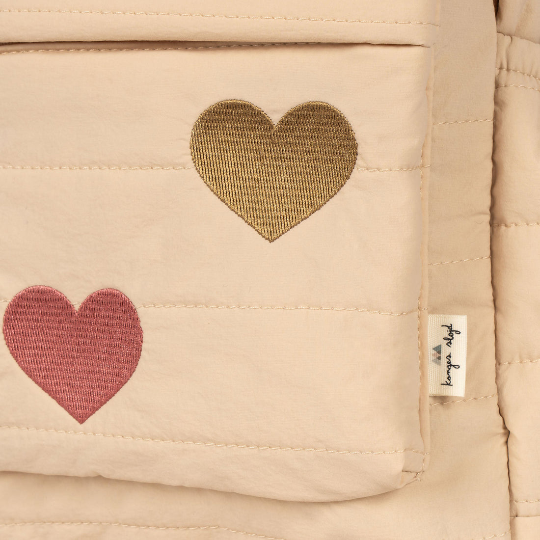 konges-slojd-juno-quilted-backpack-midi-frappe-os-kong-s24ks100325-frappe-o