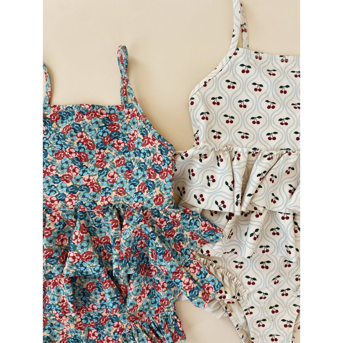 konges-slojd-manuca-frill-swimsuit-rosie-blue-kong-s24ks100381-rb-12m