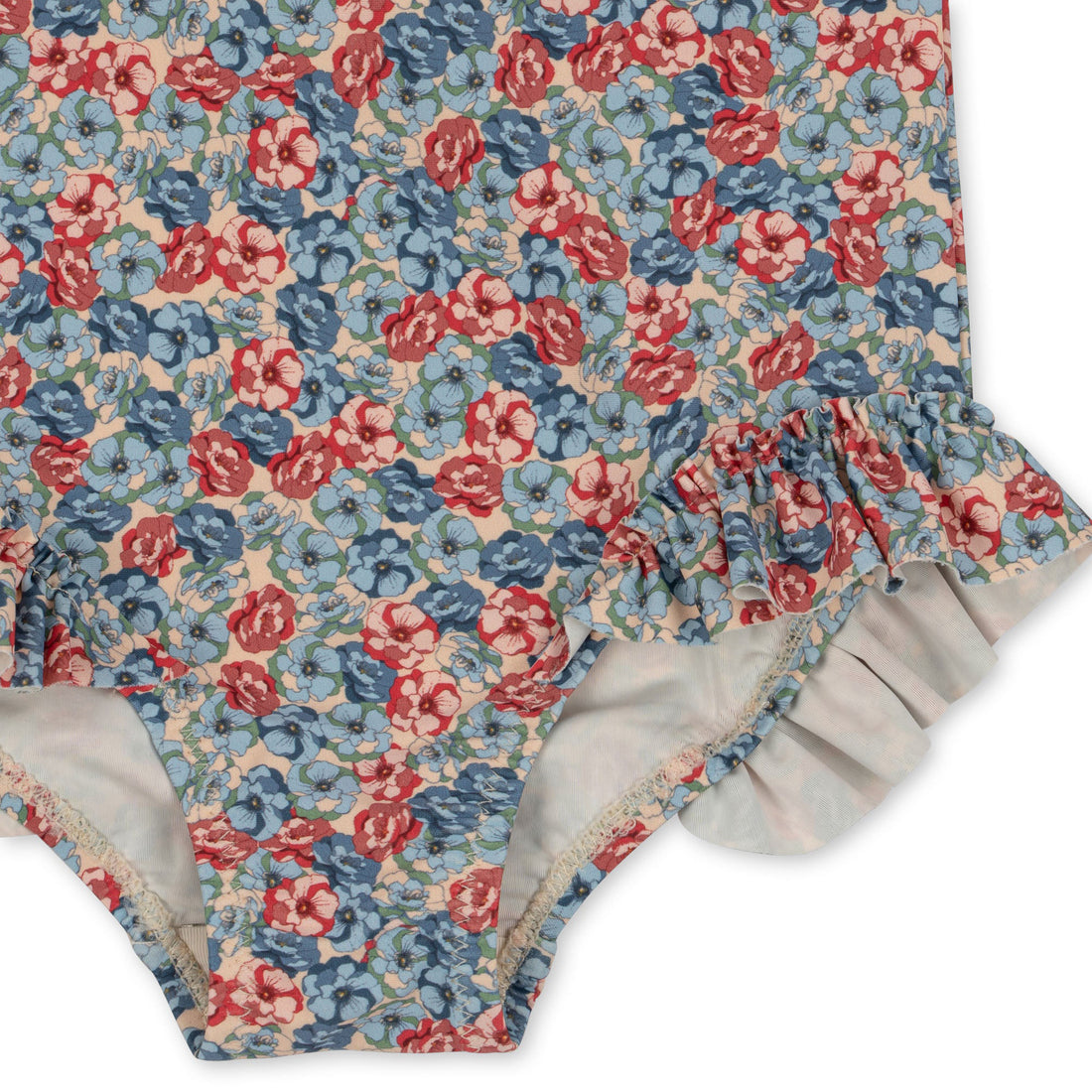 konges-slojd-manuca-ls-frill-swimsuit-rosie-blue-kong-s24ks100382-rb-12m