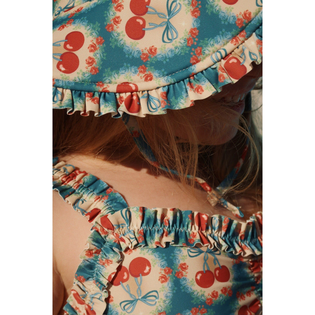 konges-sløjd-maya-swimsuit-grs-cherry-bow-blue-kong-s25ks102677-cbb-12m