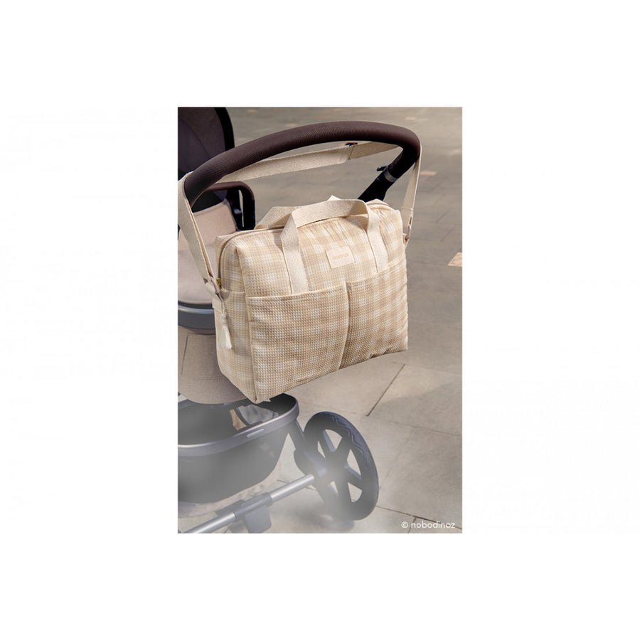 nobodinoz-gala-waterproof-changing-bag-35x27x14-ivory-checks-nobo-4929709