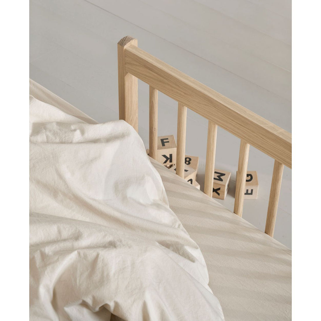 Oliver Furniture Wood Mini+ Cot Bed (With Junior Conversion Kit) - Oak (Pre-Order; Est. Delivery in 6-10 Weeks)