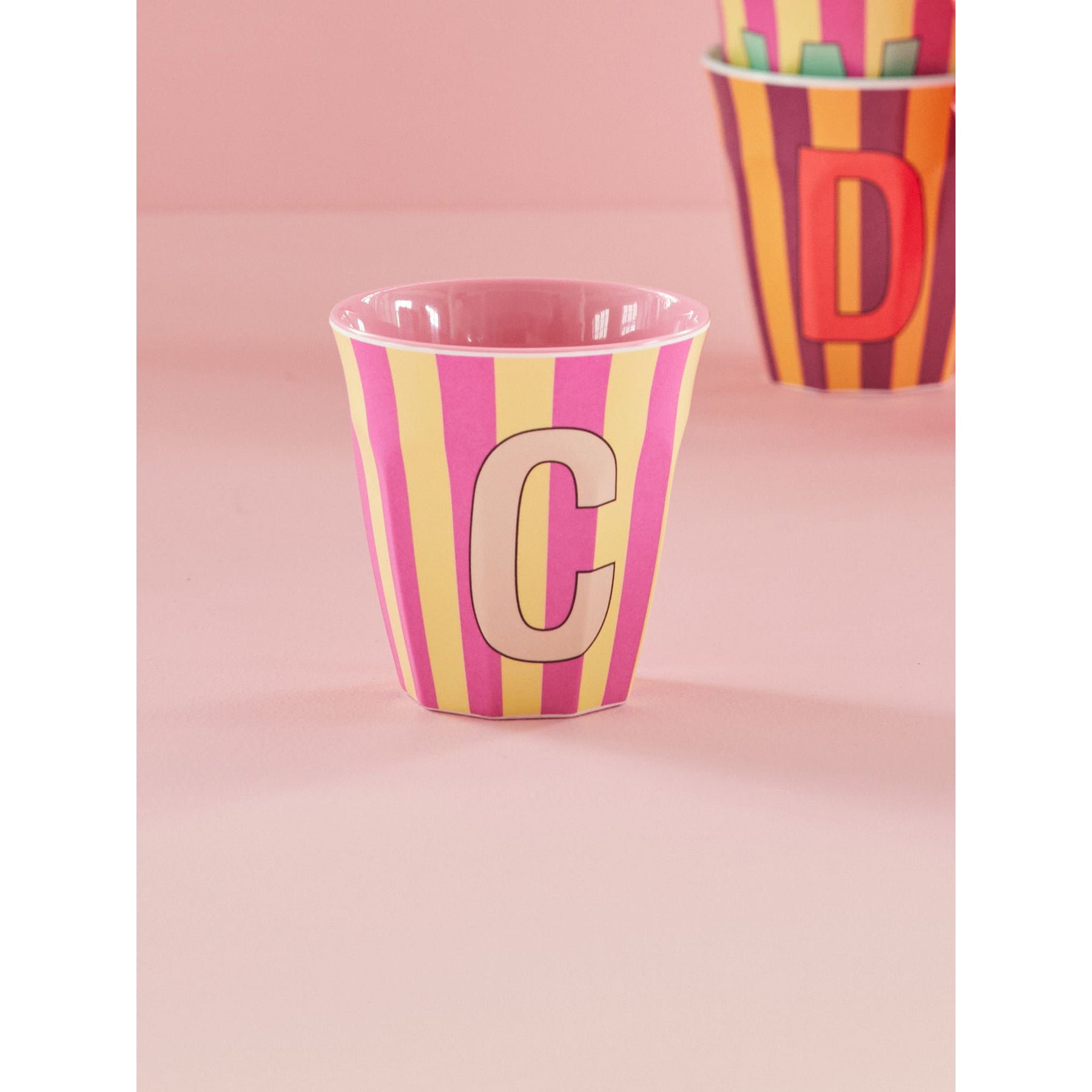 rice-dk-melamine-cup-with-the-letter-c-stripes-pinkish-medium-250ml-rice-melcu-alpstrci