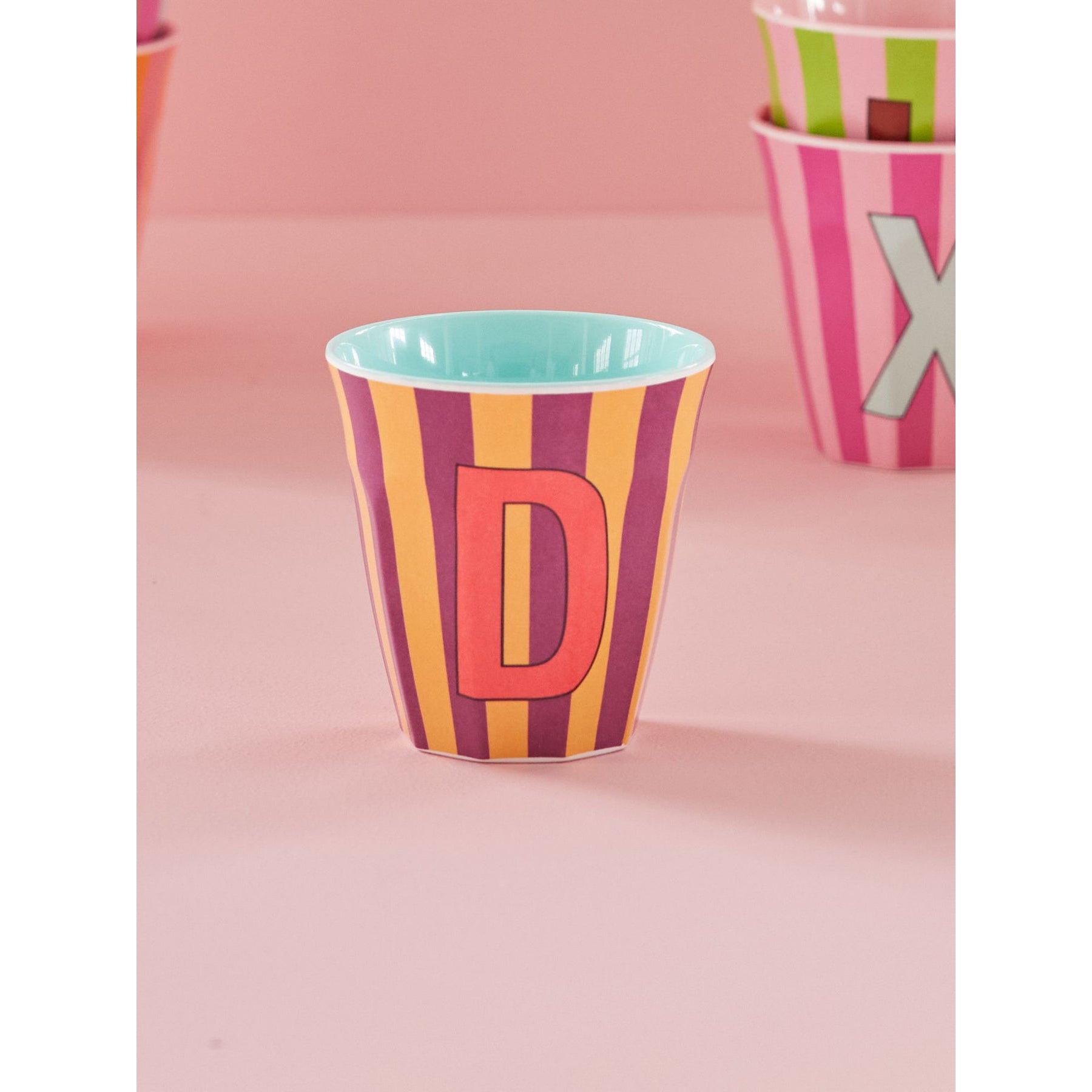 rice-dk-melamine-cup-with-the-letter-d-stripes-pinkish-medium-250ml-rice-melcu-alpstrdi