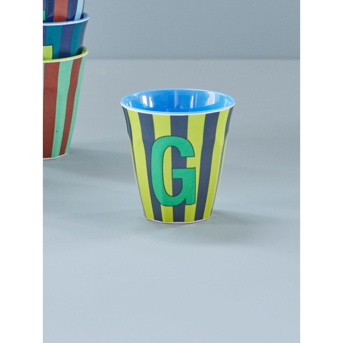 rice-dk-melamine-cup-with-the-letter-g-stripes-blueish-medium-250ml-rice-melcu-alpstrgb