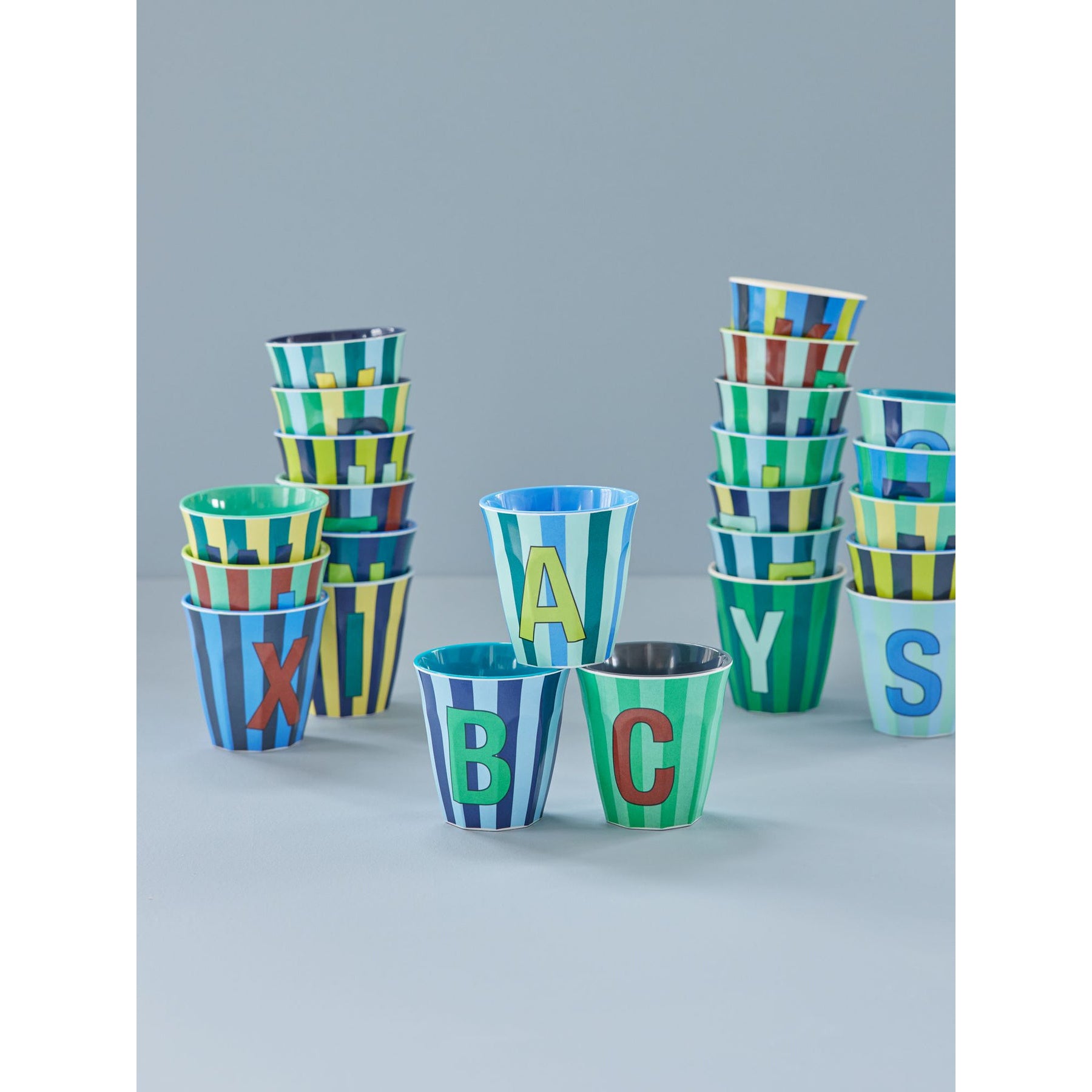 rice-dk-melamine-cup-with-the-letter-k-stripes-blueish-medium-250ml-rice-melcu-alpstrkb