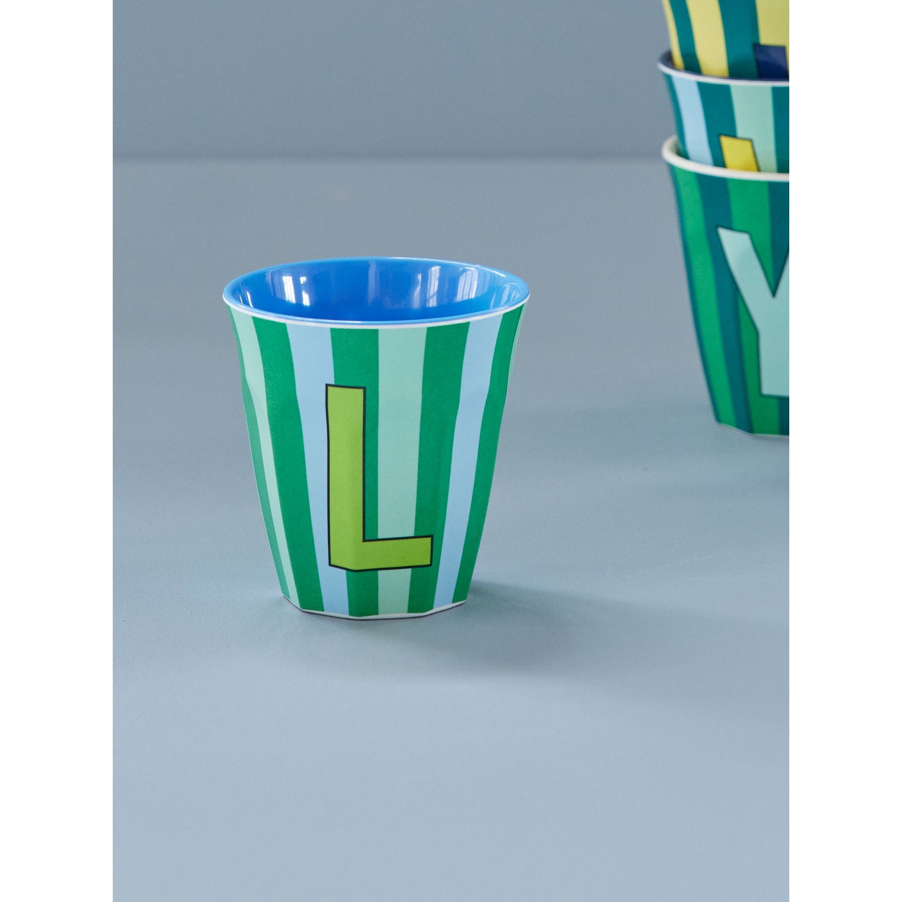 rice-dk-melamine-cup-with-the-letter-l-stripes-blueish-medium-250ml-rice-melcu-alpstrlb