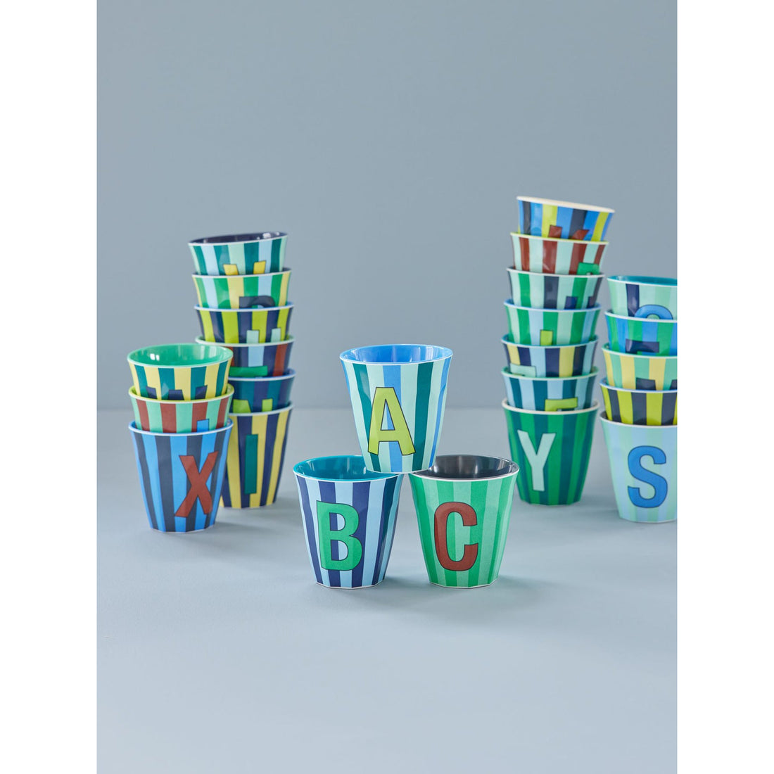 rice-dk-melamine-cup-with-the-letter-m-stripes-blueish-medium-250ml-rice-melcu-alpstrmb