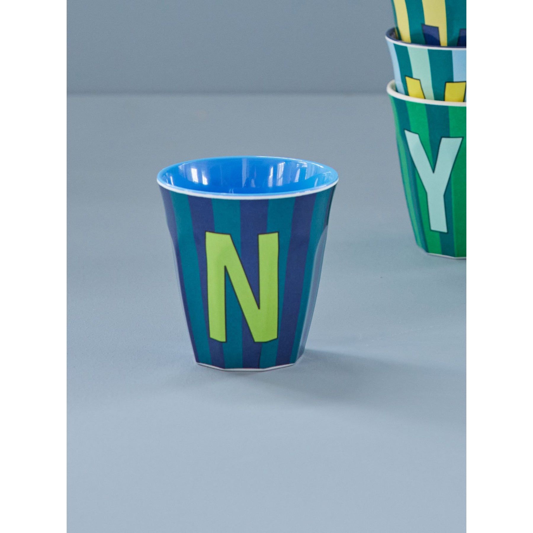 rice-dk-melamine-cup-with-the-letter-n-stripes-blueish-medium-250ml-rice-melcu-alpstrnb