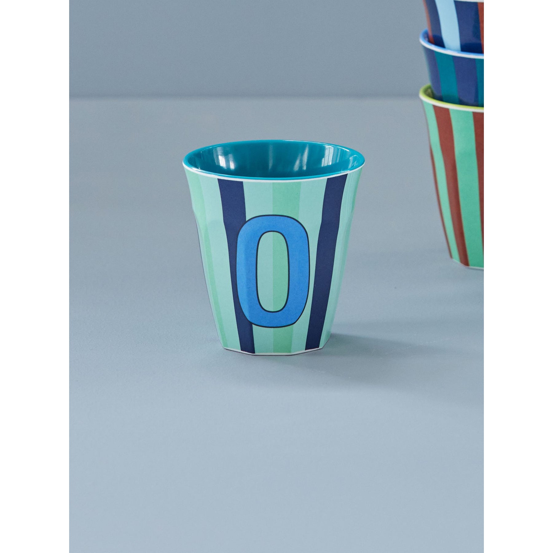 rice-dk-melamine-cup-with-the-letter-o-stripes-blueish-medium-250ml-rice-melcu-alpstrob