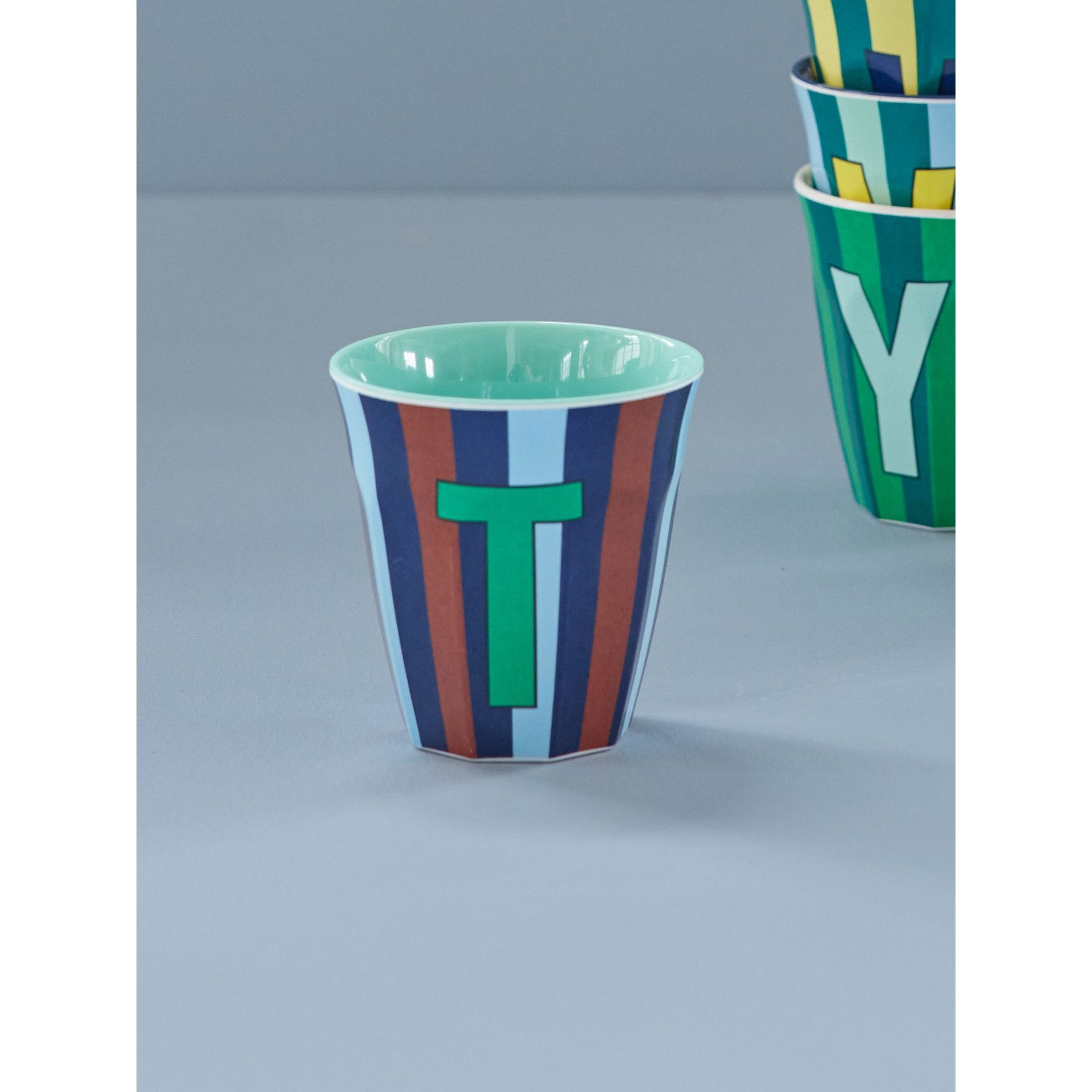 rice-dk-melamine-cup-with-the-letter-t-stripes-blueish-medium-250ml-rice-melcu-alpstrtb