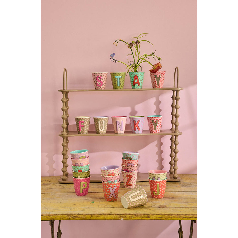 rice-dk-melamine-cup-with-the-letter-x-flowers-medium-250-ml