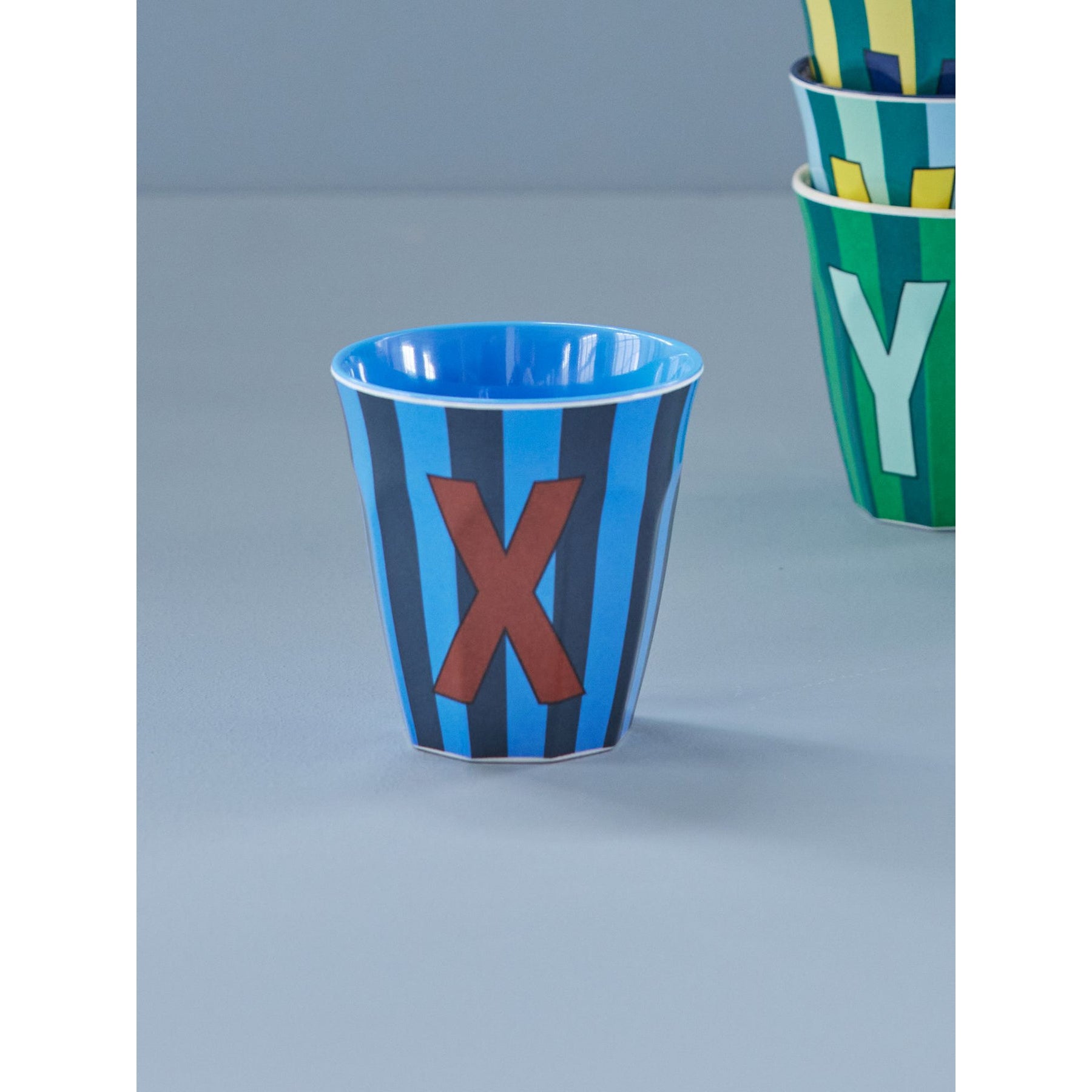 rice-dk-melamine-cup-with-the-letter-x-stripes-blueish-medium-250ml-rice-melcu-alpstrxb