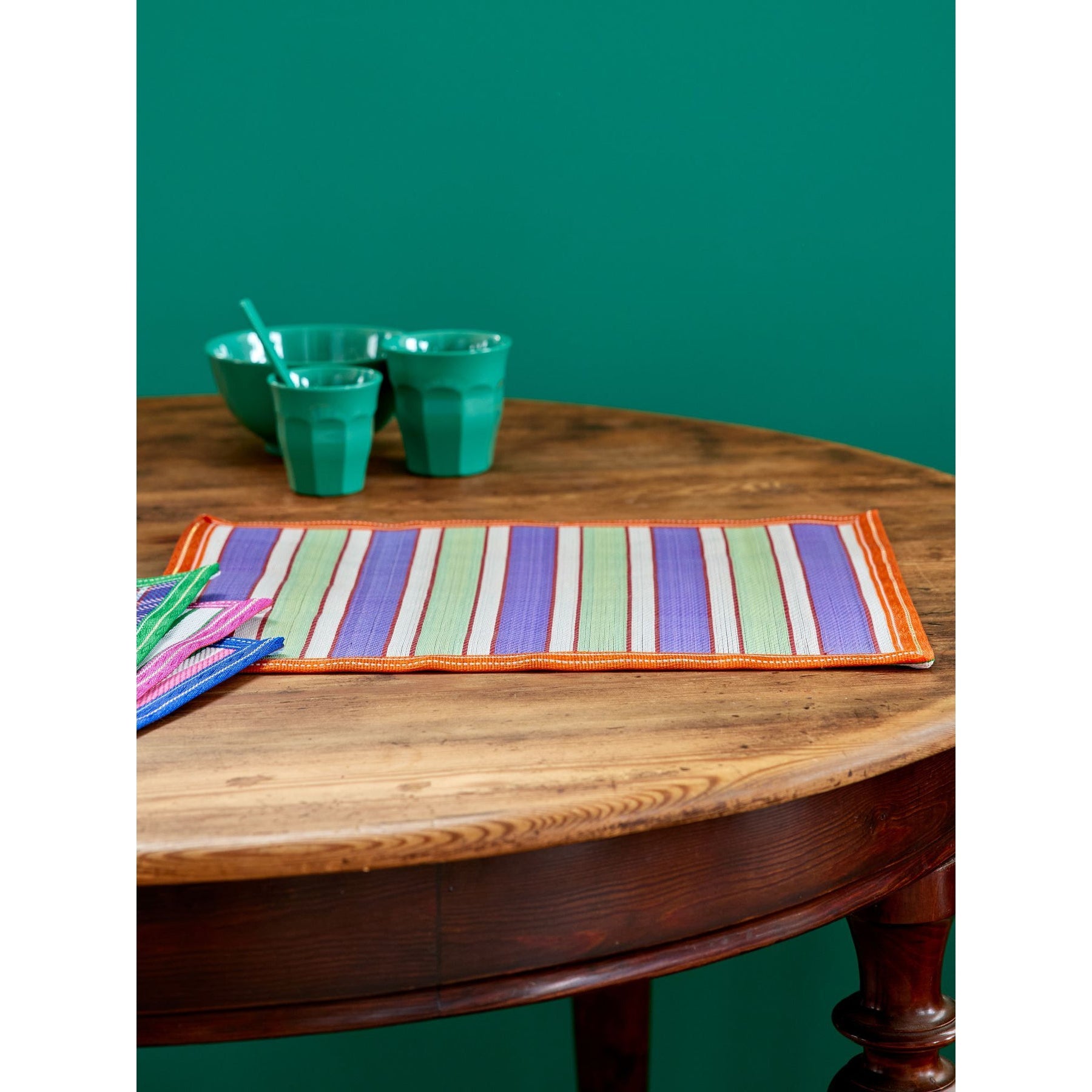 rice-dk-recycled-placemat-with-green-purple-and-orange-stripes-rice-plmat-edgeo
