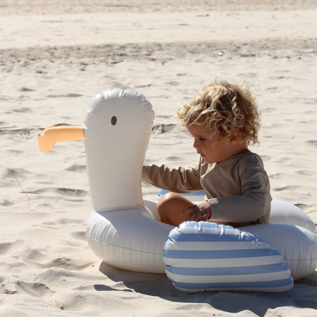 sunnylife-kids-tube-pool-ring-sid-the-seagull-blue-stripe-sunl-s51tprbl