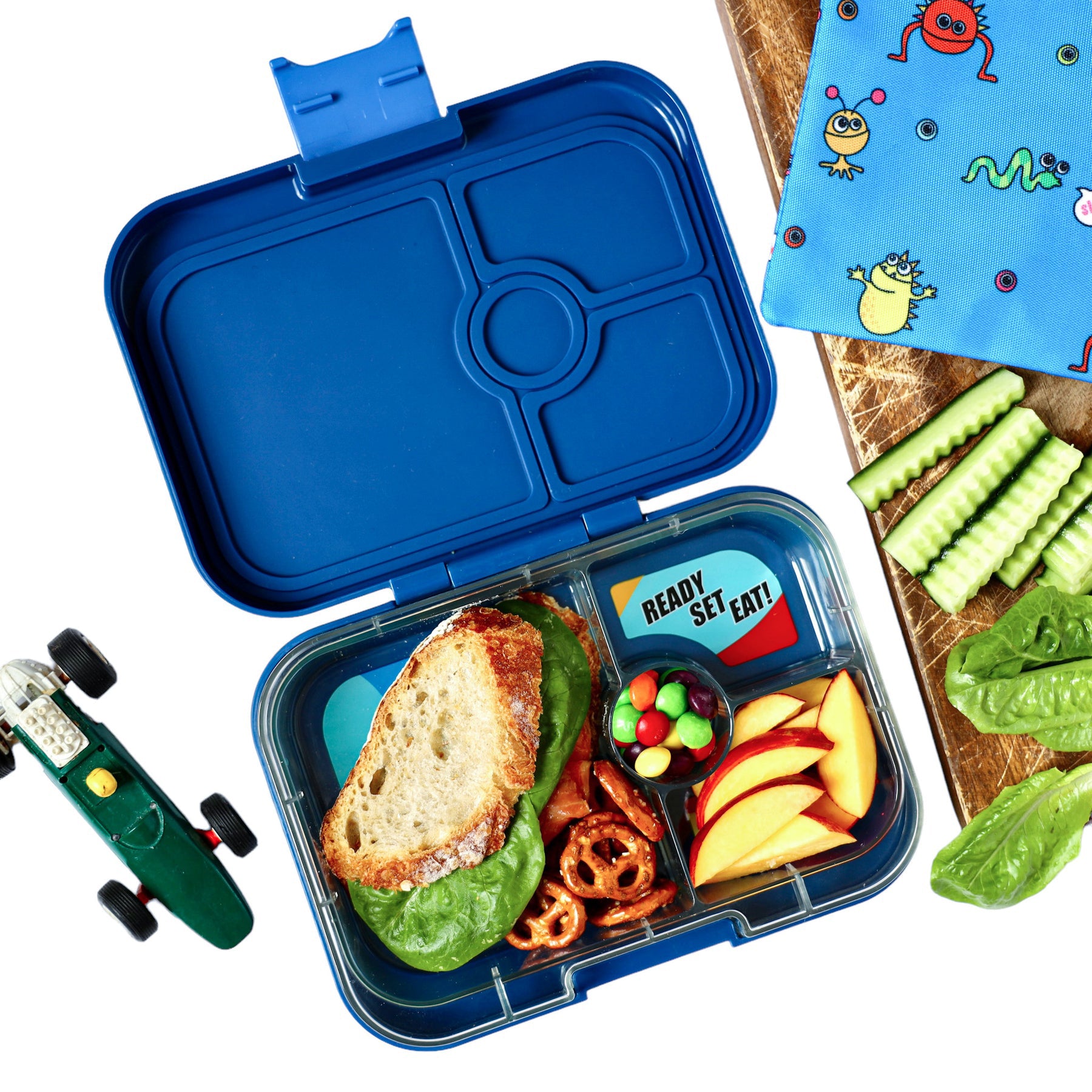 yumbox-panino-4-compartment-monte-carlo-blue-race-cars-yumb-mbii202303c
