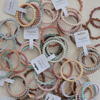mushie-flower-teething-bracelet-3-pack-blush-rose-shifting-sand-mush-2600278- (3)