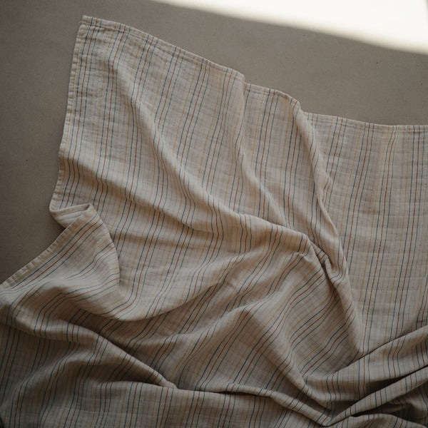 mushie-muslin-swaddle-blanket-organic-cotton-retro-stripes-mush-2200380- (2)