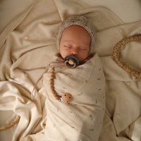 mushie-muslin-swaddle-blanket-organic-cotton-rocket-ship-mush-2200328- (2)